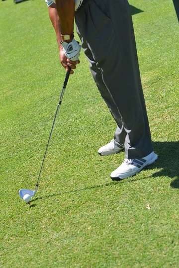 man playing golf on a course